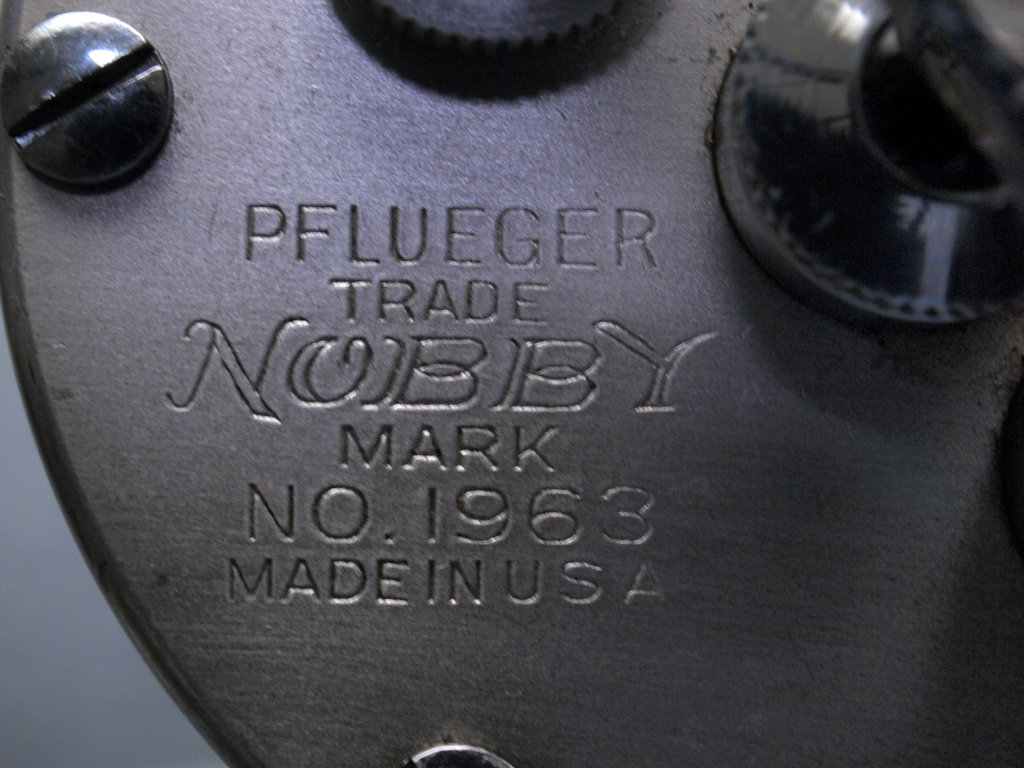 Pflueger Nobby model 1963 - logo